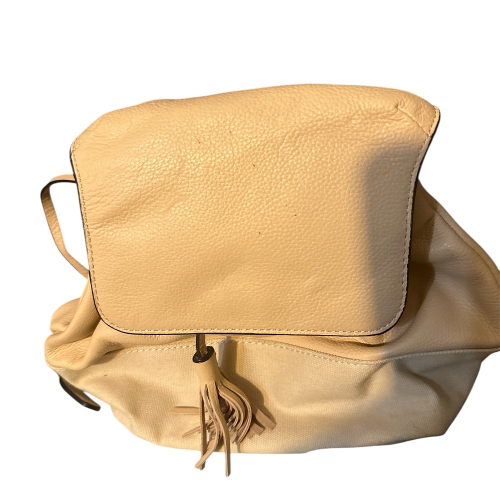 Rebecca Minkoff Tan Leather Backpack tassel and gold hardware strap is two ways